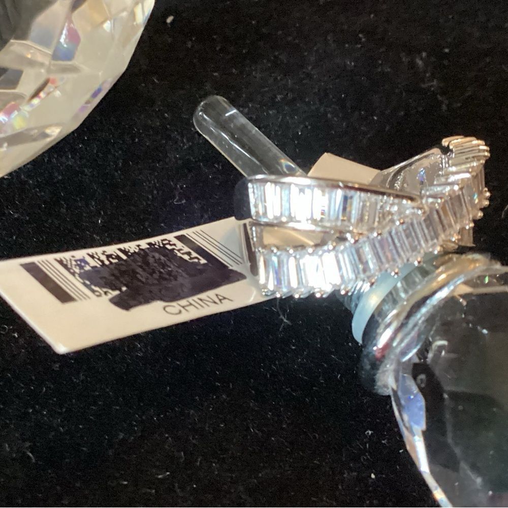 NWT. Elegant Sterling Silver Baguette CZ Cross Over Ring (Bella Luce)